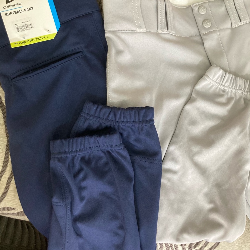 Two pairs of NEW Champro Fastpitch softball pants size small and 2 belts